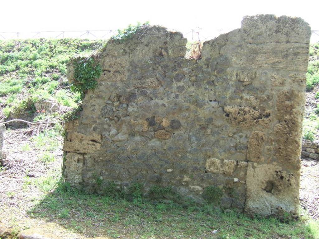 III.11.2 Pompeii. May 2006. Entrance on left, and III.11.1 on right (with wall with window of side east room of III.11.1)