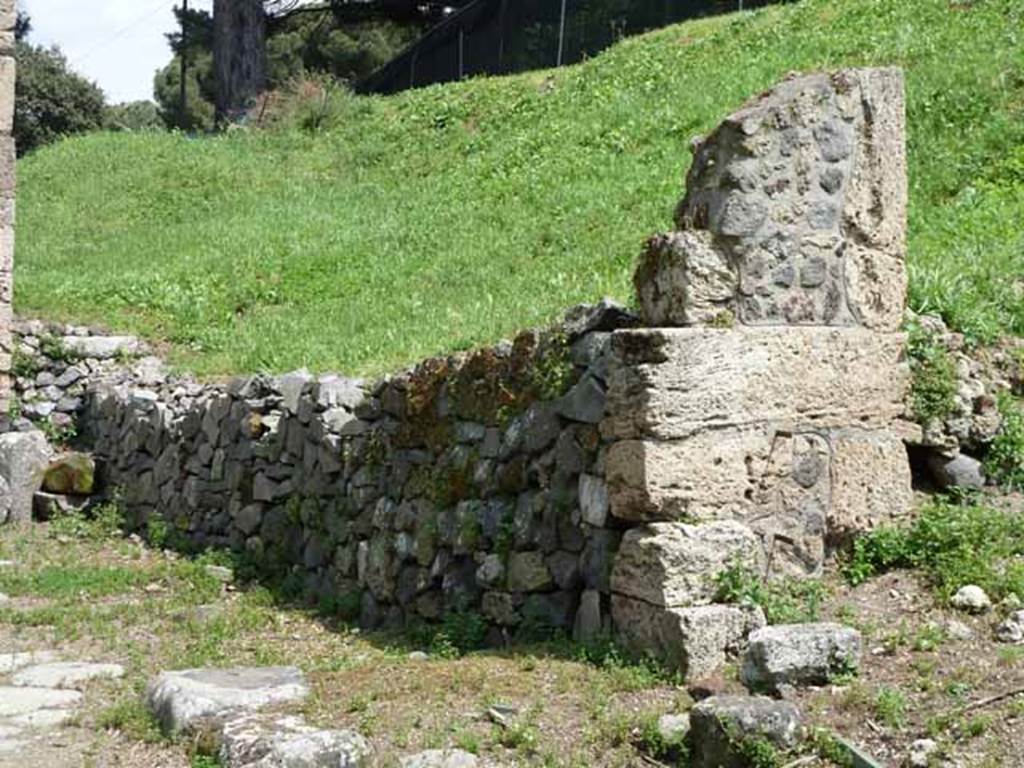 III.11.6 Pompeii. May 2010. Looking east to the boundary of III.11, and the unnamed vicolo behind the modern built wall.