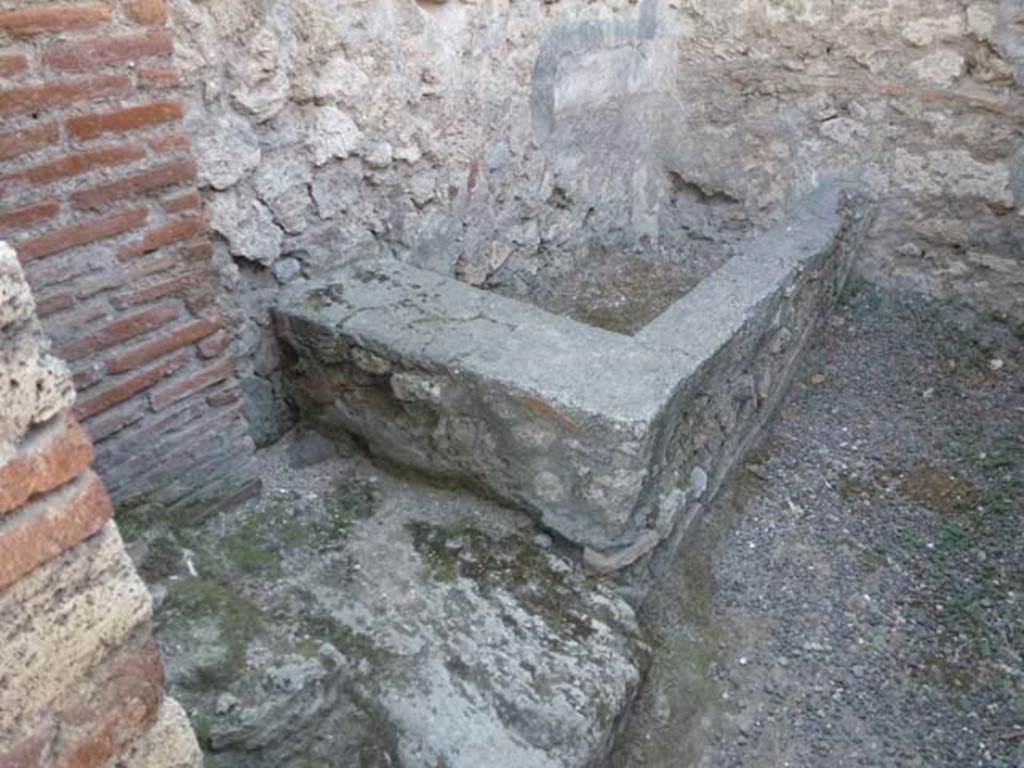 V.1.4 Pompeii. June 2012. Looking towards west side of rear room through doorway. Photo courtesy of Michael Binns.