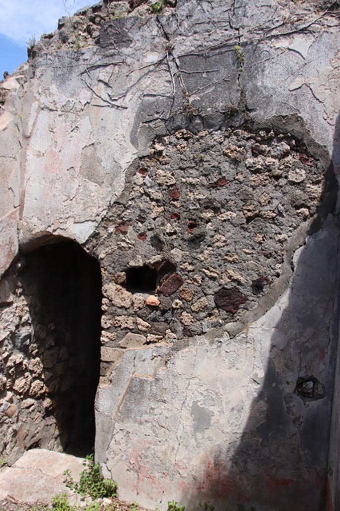 V.1.7 Pompeii. May 2024. 
Room 19, east wall with doorway into corridor (h2). Photo courtesy of Klaus Heese.
