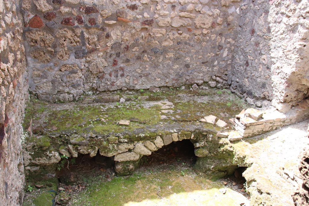 V.1.7 Pompeii. May 2024. Room “l” (L), looking towards west wall with kitchen hearth. Photo courtesy of Klaus Heese.