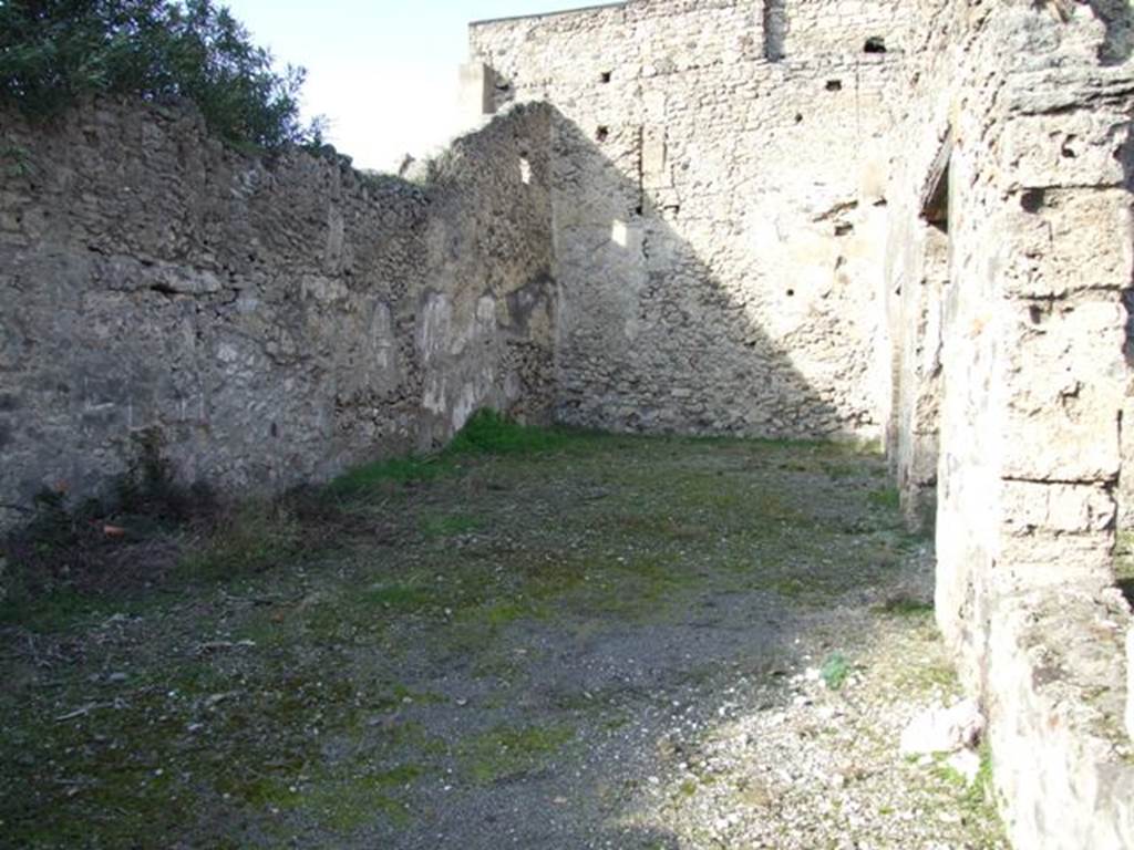 V.2.7 Pompeii. December 2007. Room 12, garden area. According to Jashemski, 15 amphorae were found in the garden.
See Jashemski, W. F., 1993. The Gardens of Pompeii, Volume II: Appendices. New York: Caratzas. (p.111)
According to PPM, the area around the garden area 11 and room 10, were protected by the roof that covered rooms 11, 13, 14 and 15 and also protruded out into the garden area, forming a sort of covered passage, even in the absence of a portico.
See Carratelli, G. P., 1990-2003. Pompei: Pitture e Mosaici, III. Roma: Istituto della enciclopedia italiana, p.824.

