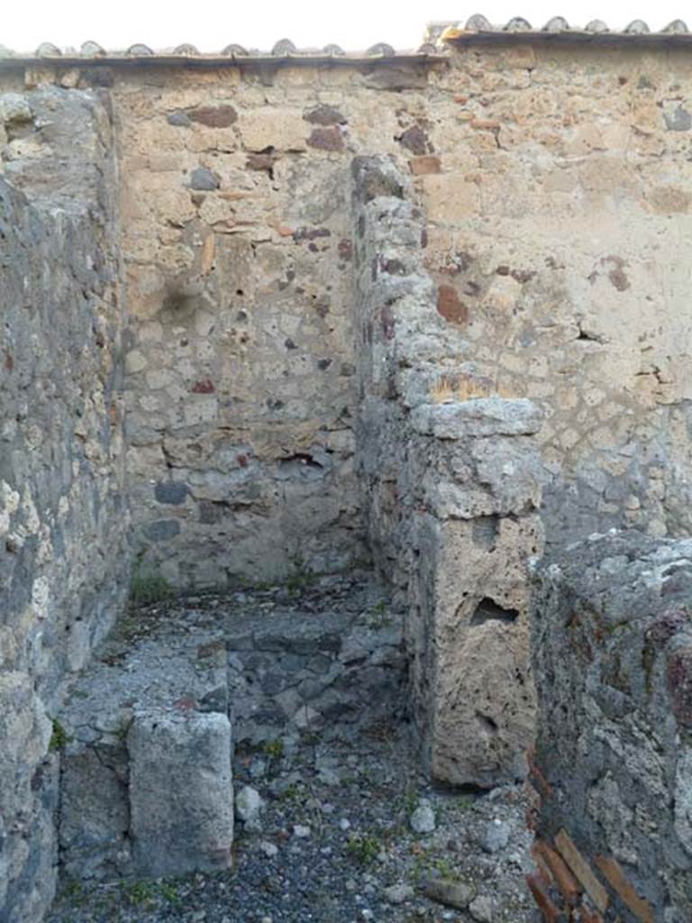 VI.2.24 Pompeii. May 2011. Kitchen area, at north end of small corridor from atrium. In the east wall of the kitchen area was the doorway linking with the shop at VI.2.23.  
