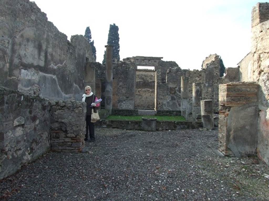 VI.5.4 Pompeii. December 2007. Room 6, looking west through tablinum across atrium, towards entrance doorway.