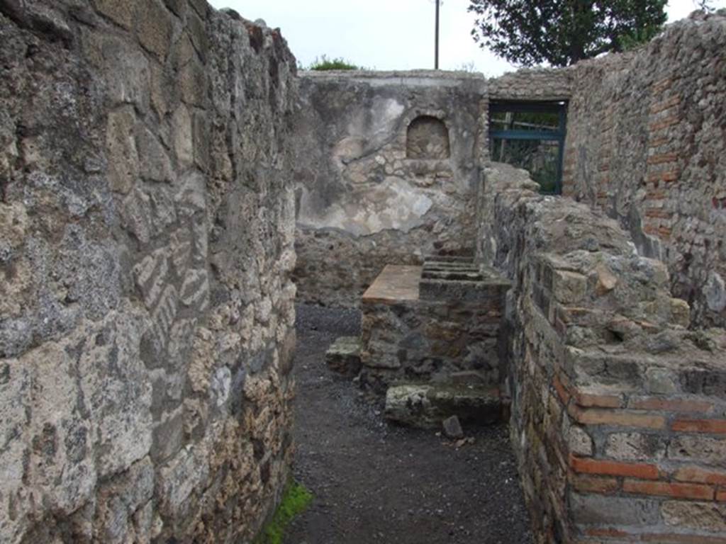 VI.6.1 Pompeii. December 2007. Room 16, looking north towards kitchen area in north-west corner of peristyle.
