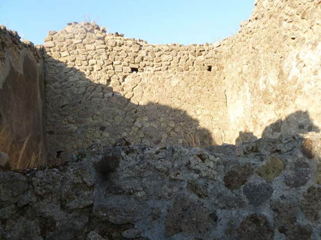 VI.7.1 Pompeii. May 2011. East wall of small room (lower wall), at rear can be seen a wall of VI.7.15.