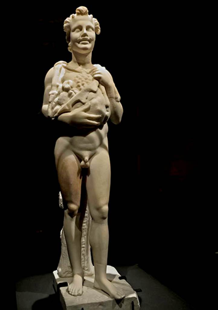 VI.8.3 Pompeii. 28th January 1825, found in the tablinum was a marble statuette of a faun, broken in three pieces.
He is carrying a goatskin full of fruit around his neck.
Now in Naples Archaeological Museum. Inventory number 6347.
See Pagano, M. and Prisciandaro, R., 2006. Studio sulle provenienze degli oggetti rinvenuti negli scavi borbonici del regno di Napoli. Naples: Nicola Longobardi, p. 132.
Photo courtesy of Mary Harrsch. Use subject to CC BY-NC-SA 2.0
