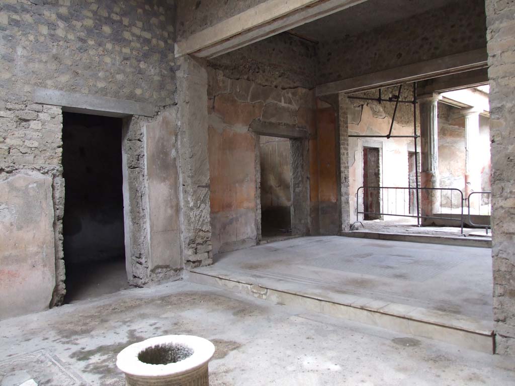 VI.8.5 Pompeii. March 2009. Room 1, looking north-west across atrium, to room 8 and doorway from tablinum to room 7.