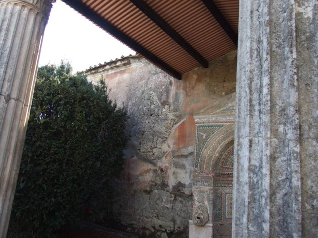 VI.8.22 Pompeii. March 2009. Room 11, west wall of garden area, with remains of painted plaster of garden paintings. According to Jashemski, a simple garden painting was still visible on the south side (left) of the fountain. See Jashemski, W. F., 1993. The Gardens of Pompeii, Volume II: Appendices. New York: Caratzas. (p.135)
