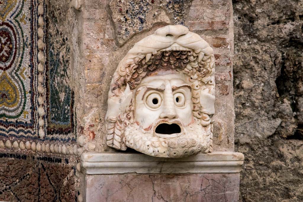 VI.8.22 Pompeii. January 2019. Hollow marble mask on north side of fountain. Photo courtesy of Johannes Eber.