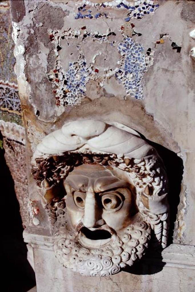 VI.8.22 Pompeii. 1968. Hollow marble mask of bearded male figure on north side of fountain. 
Photo by Stanley A. Jashemski.
Source: The Wilhelmina and Stanley A. Jashemski archive in the University of Maryland Library, Special Collections (See collection page) and made available under the Creative Commons Attribution-Non Commercial License v.4. See Licence and use details.
J68f1247
