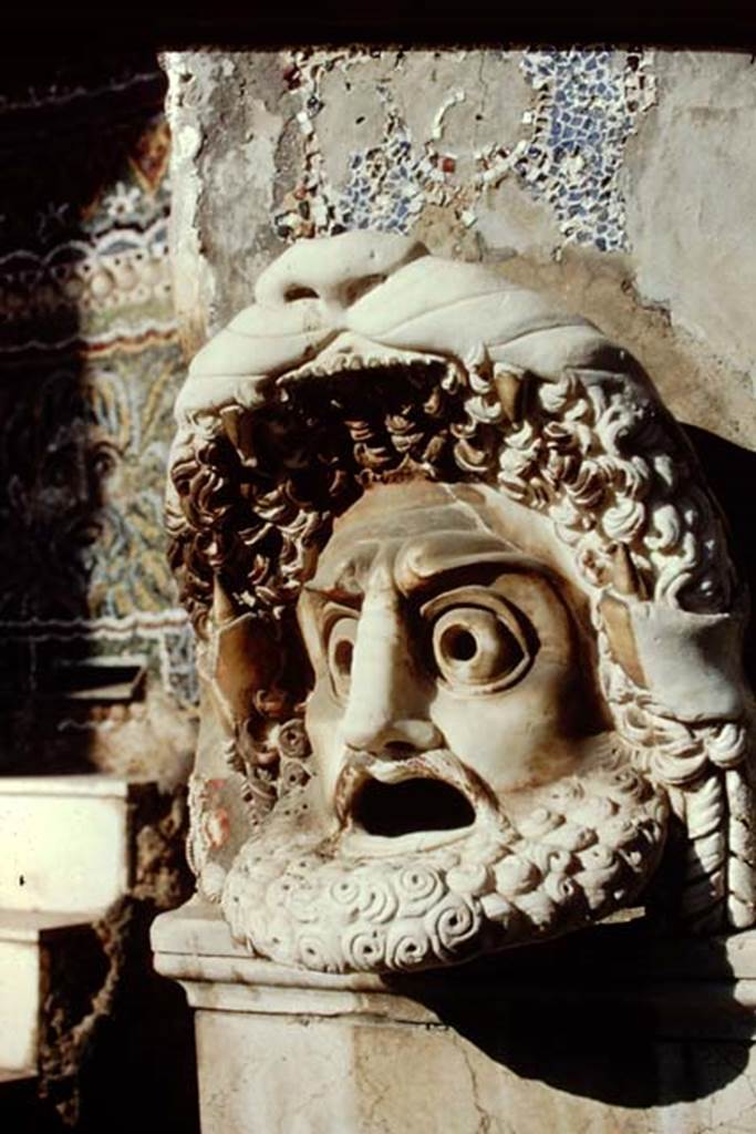 VI.8.22 Pompeii. 1968. Hollow marble mask of bearded male figure on north side of fountain. 
Photo by Stanley A. Jashemski.
Source: The Wilhelmina and Stanley A. Jashemski archive in the University of Maryland Library, Special Collections (See collection page) and made available under the Creative Commons Attribution-Non Commercial License v.4. See Licence and use details.
J68f1246

