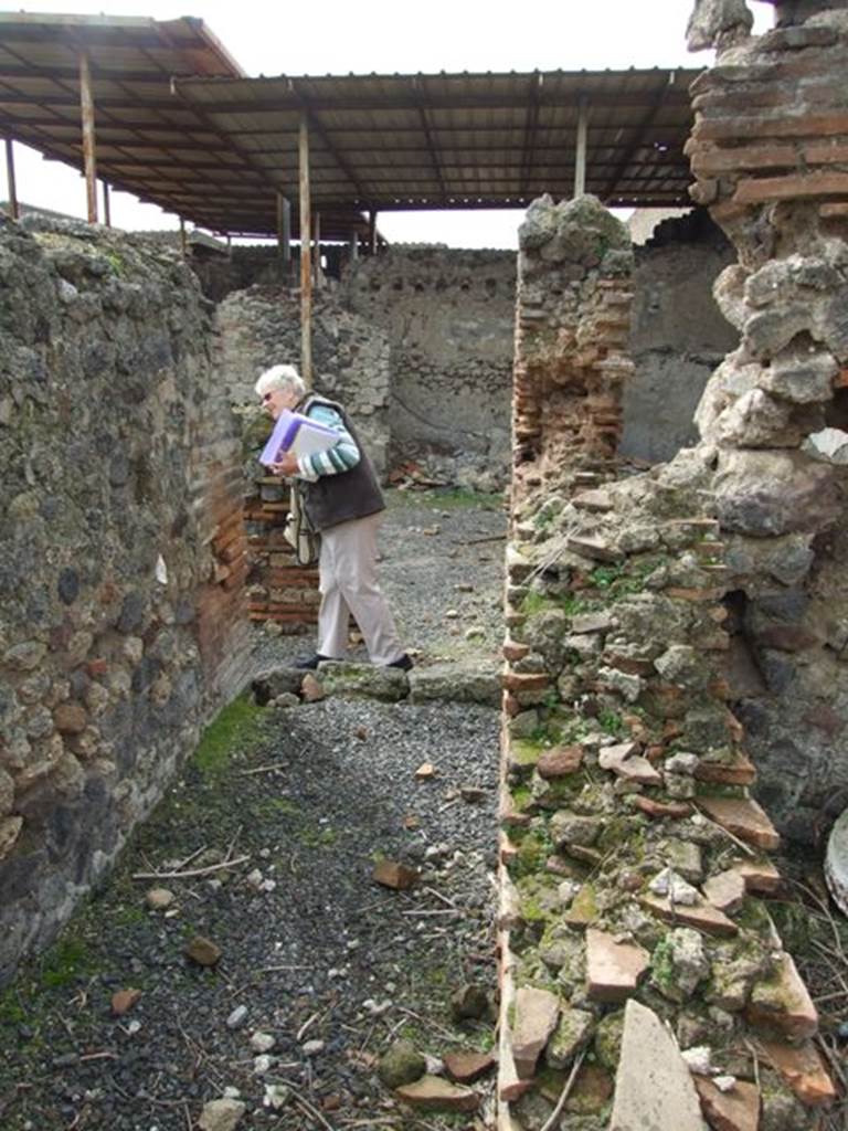 VI.9.7 Pompeii.  March 2009. Room 2.  Corridor on south side of room 1.  Looking west past entrance to room 8.