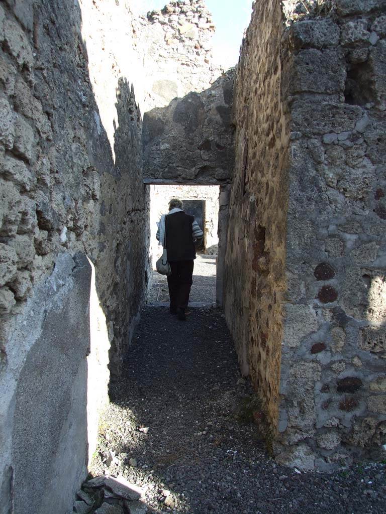 VI.14.22 Pompeii. December 2007. Room 7, corridor looking east to atrium.