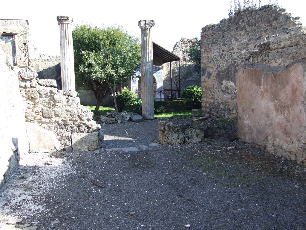 VI.14.43 Pompeii. December 2007. Room 7, looking east across tablinum towards west portico.