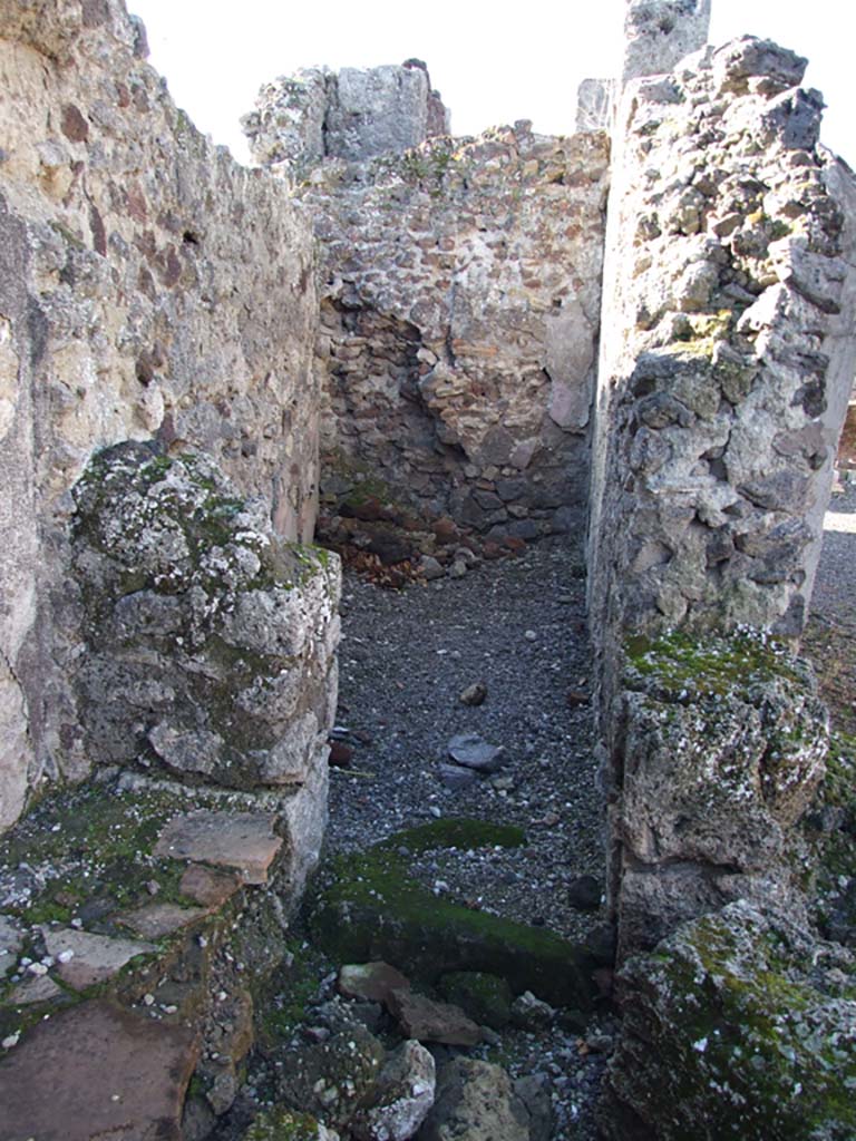 VI.14.43 Pompeii.  December 2007. Looking west into room 13 from bench at room 12, on west portico.  