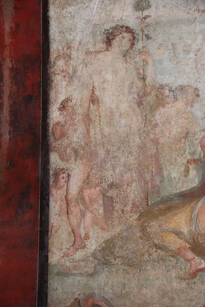 VI.15.1 Pompeii. October 2024. 
Detail from central wall painting from south wall of Bacchus watching over the sleeping Ariadne. 
Photo courtesy of Klaus Heese.
