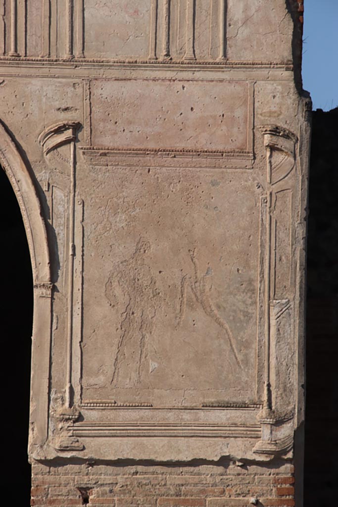 VII.1.8 Pompeii. October 2022. 
Detail of remaining stucco on north side of arched entrance. Photo courtesy of Klaus Heese.
