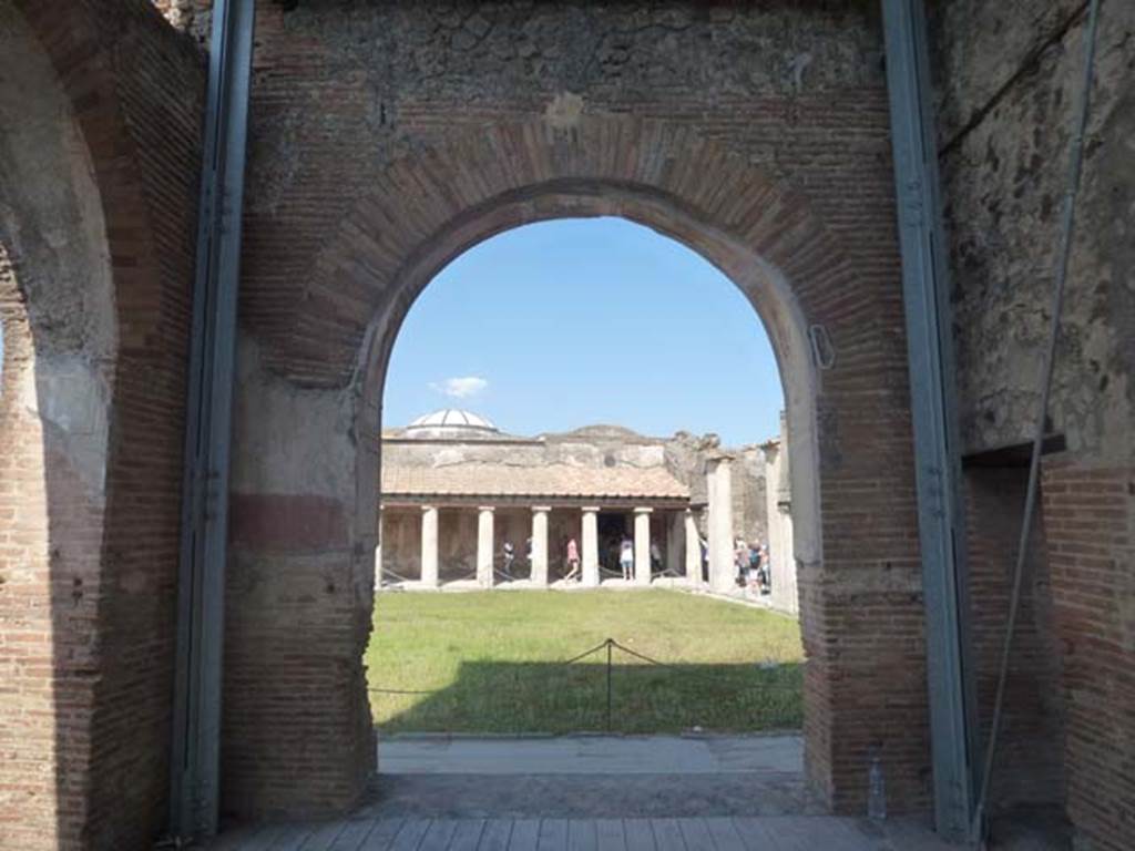 VII.1.8 Pompeii. June 2012. Nymphaeum F, looking east across gymnasium C to portico B and entrance A. Photo courtesy of Michael Binns.