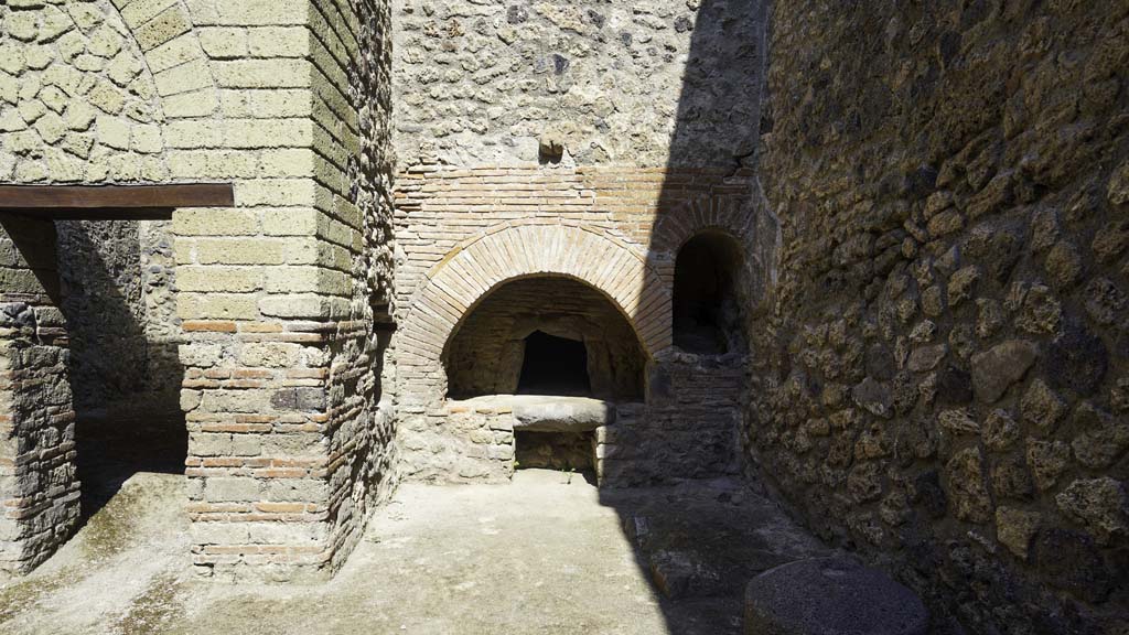 VII.1.46 Pompeii. August 2021. 
Looking north across kitchen/bakery area 12 with doorway to room 13 on left. Photo courtesy of Robert Hanson.
