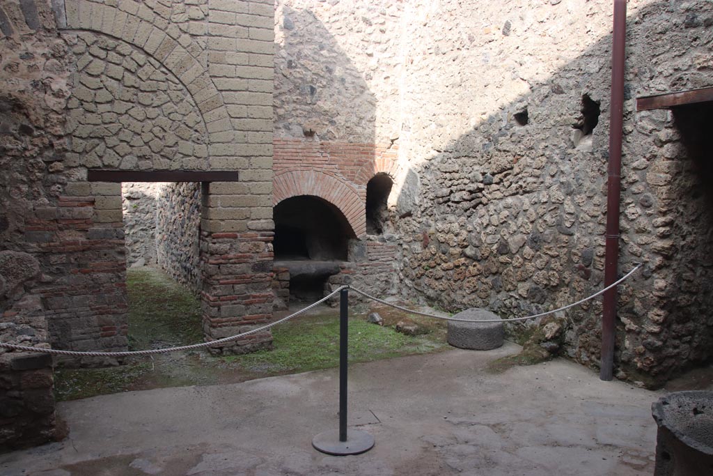 VII.1.46 Pompeii. October 2023. Looking north-east across kitchen/bakery area. Photo courtesy of Klaus Heese.