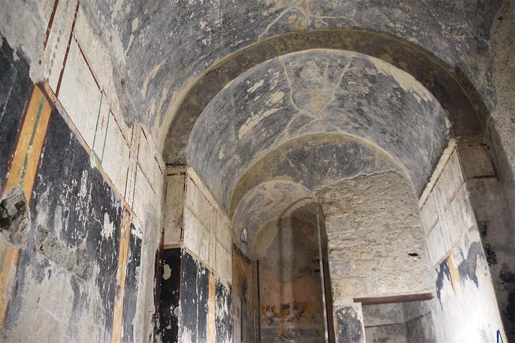 VII.5.8 Pompeii. July 2023. 
Looking north across changing room 46, towards Piscina 48, on left, with square doorway to corridor 45, on right.
Work carried out under the auspices of the Archaeological Park of Pompeii since May 2022 has transformed their appearance.
Photograph © Parco Archeologico di Pompei.

