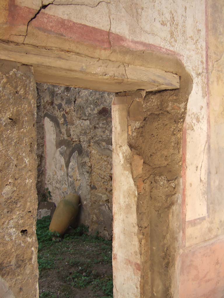 VII.7.13 Pompeii. September 2005. Doorway to room on east side of rear entrance doorway.