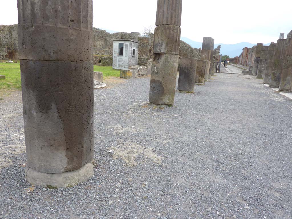 VII.8, Pompeii Forum. March 2014. Looking south-east along portico in south-east corner of Forum, from outside VIII.3.2/3, on left. 
Foto Annette Haug, ERC Grant 681269 DÉCOR.
