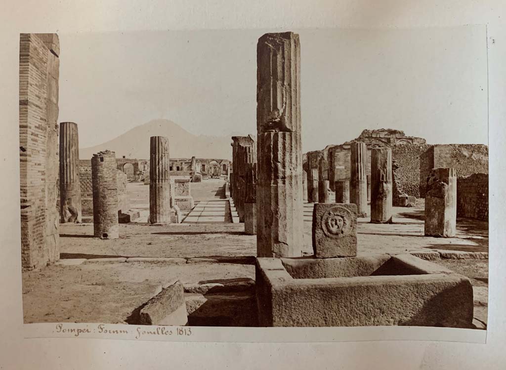 VII.8 Pompeii Forum. Album by M. Amodio, c.1880, entitled “Pompei, destroyed on 23 November 79, discovered in 1748”.
Looking north from south-east corner, and fountain in Via delle Scuole.   Photo courtesy of Rick Bauer.

