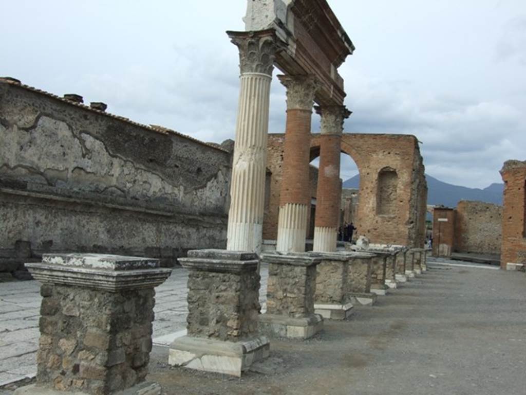 VII.8 Pompeii Forum. December 2007. Looking north along the east side, from outside VII.9.7 the Macellum. 