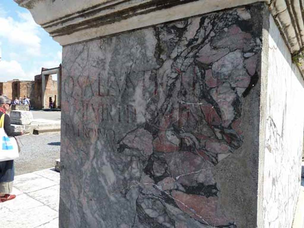 VII.8 Pompeii Forum. May 2010. West side of statue base in south-east corner, with inscription commemorating Quintus Sallustius. 