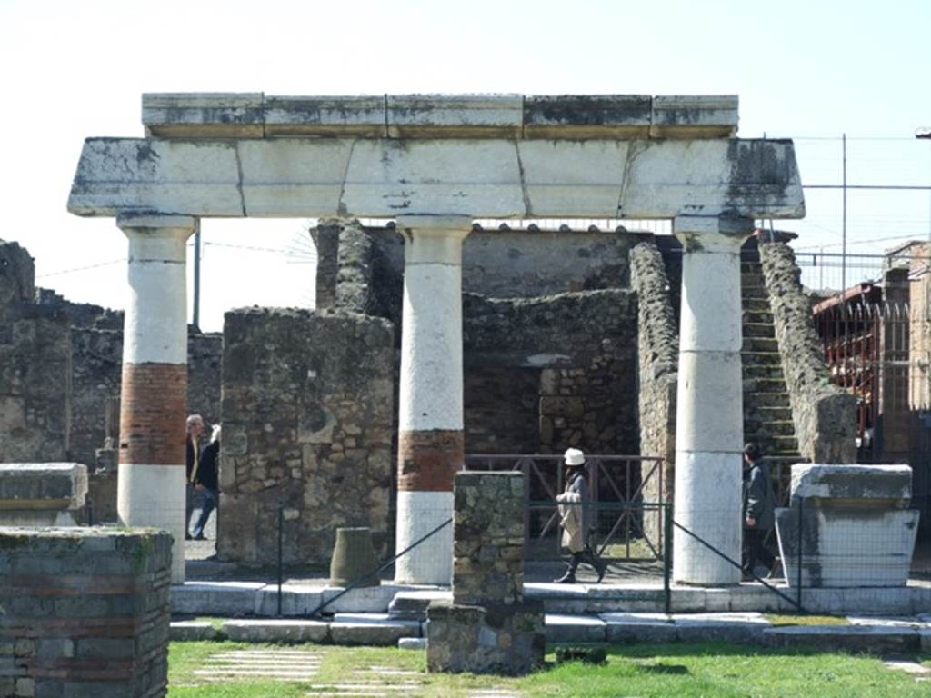 VII.8 Pompeii Forum. March 2009. Equestrian statue base in front of colonnade on west side.