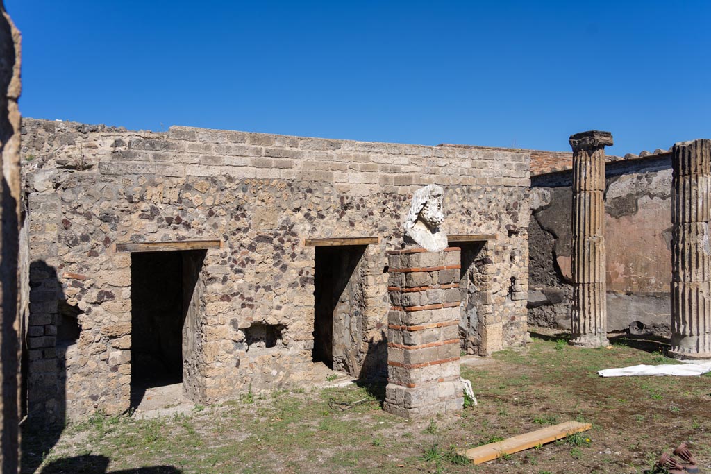 VII.8.1 Pompeii. October 2023. Looking north-east along doorways to rooms at north end of Temple. Photo courtesy of Johannes Eber.