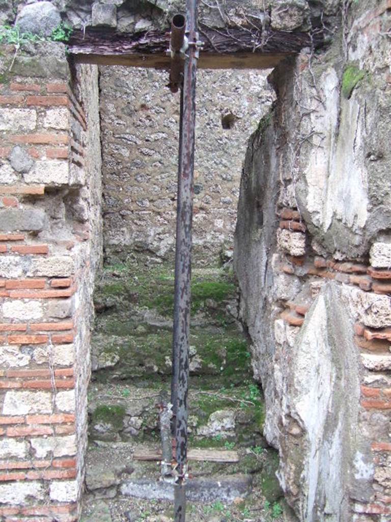 VII.11.6 Pompeii. December 2005. Stairs to upper floor on east side of atrium.  