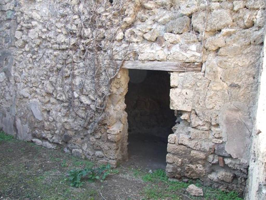 VII.11.9 Pompeii. December 2007. Doorway to stable in west wall.