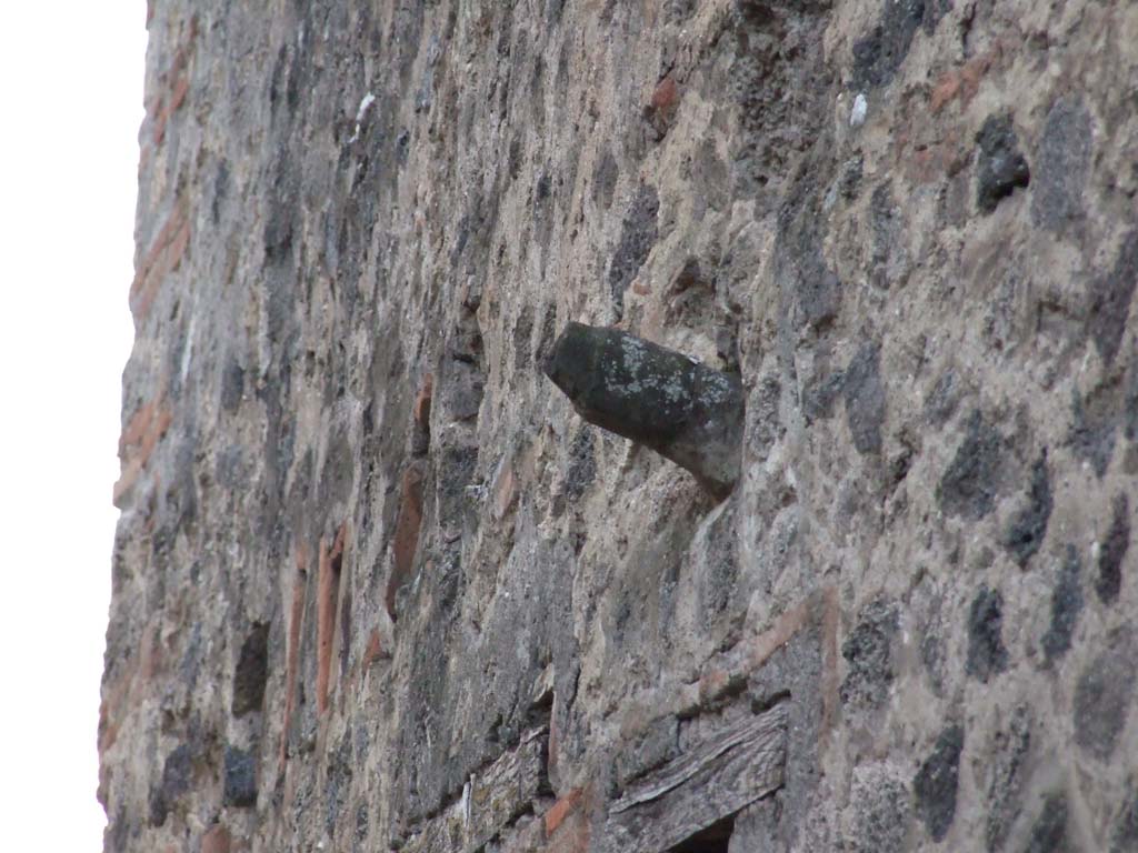 VII.11.12 Pompeii. December 2006. Phallus on outside wall above doorway.