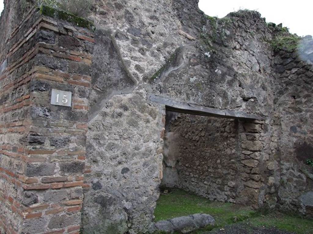 VII.11.15 Pompeii. December 2006. Looking south-west across shop, towards doorway to side room. 