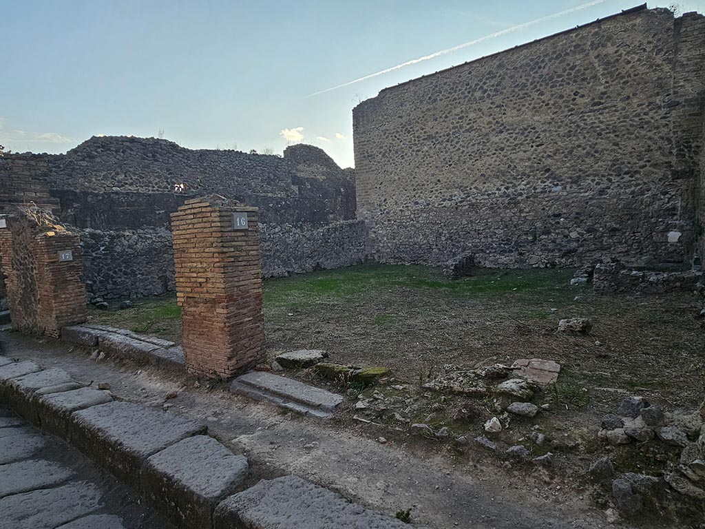 VII.11.17 and 16 Pompeii. November 2024. Looking south-west towards two entrance doorways. Photo courtesy of Annette Haug.