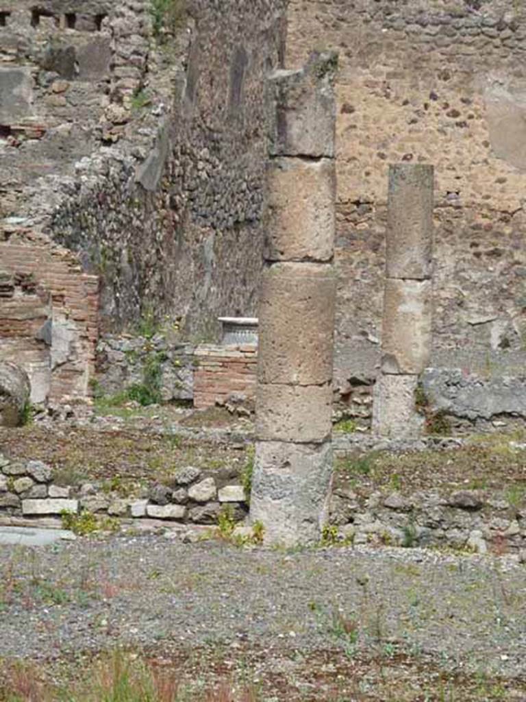 VII.13.4 Pompeii. May 2010. Looking across peristyle to west wall of large triclinium.