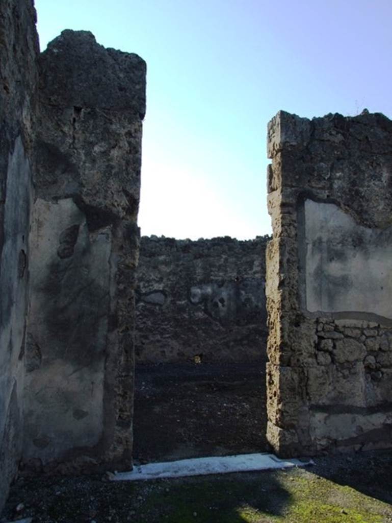 VII.15.1 Pompeii. December 2007. Looking west towards atrium of  VII.15.1, photo taken through the first connecting door from the west side of atrium of VII.15.2.

