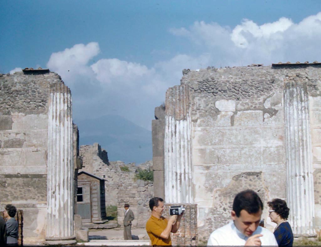 VIII.1.2 Pompeii. November 1961. Looking north through doorway in north wall of Basilica. Photo courtesy of Rick Bauer.