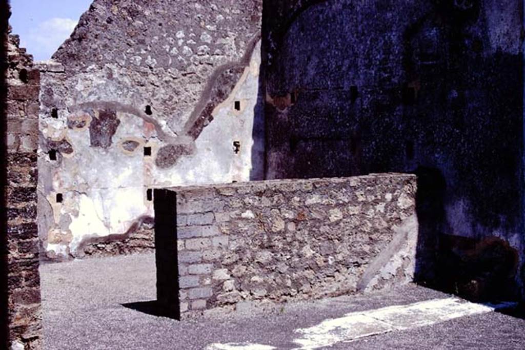 VIII.2.23 Pompeii. 1972. Dressing room? Room in south-east corner, with large holes for support of wooden shelving. 
Photo by Stanley A. Jashemski. 
Source: The Wilhelmina and Stanley A. Jashemski archive in the University of Maryland Library, Special Collections (See collection page) and made available under the Creative Commons Attribution-Non-Commercial License v.4. See Licence and use details.
J72f0232
