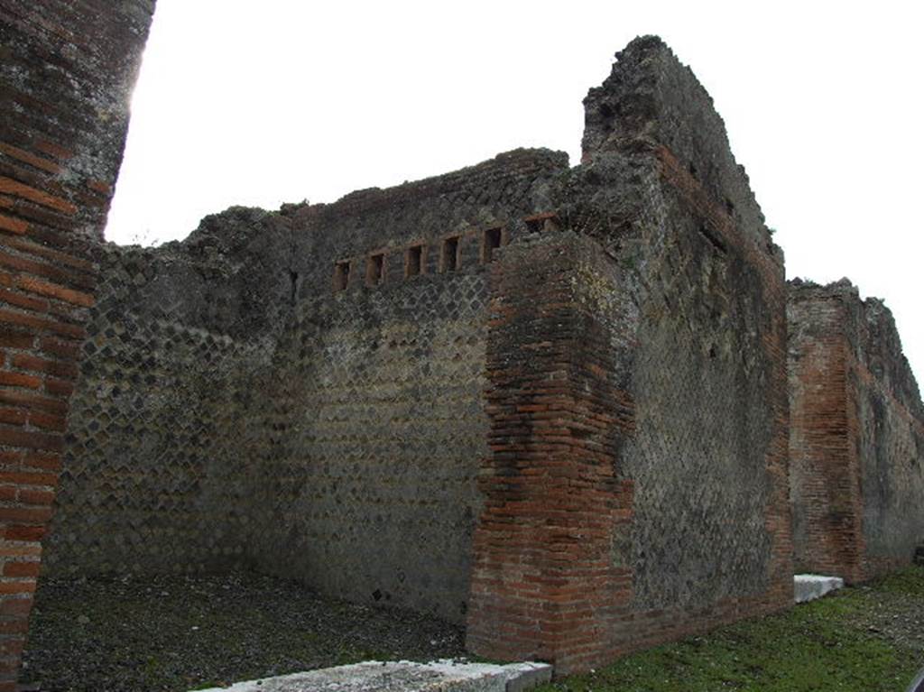 VIII.2.31 Pompeii. December 2006. Entrance doorway, looking south-west and along front wall between VIII.2.31 and VIII.2.30.