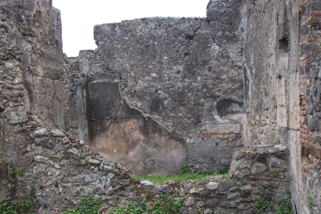 VIII.3.27 Pompeii. May 2024.  
Looking towards south wall of cubiculum on the north side of the entrance corridor, photo taken from rear room of VIII.3.28.
Photo courtesy of Klaus Heese. 
