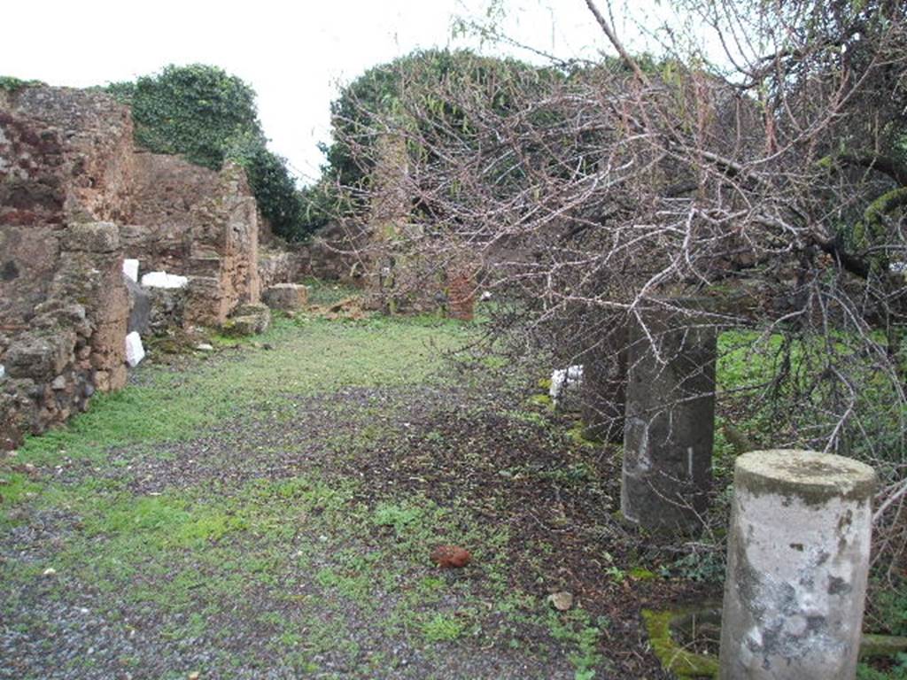 VIII.3.31 Pompeii. December 2004. Looking east across portico area from VIII.3.28.