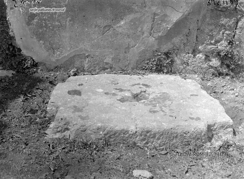 VIII.5.5/2 Pompeii. Base for the arca/money chest, near the west wall of the atrium, between (our) rooms 26 and 23.
According to Pernice –
Chest base. Found in the atrium on the right between the second room and the ala. 
Base made of travertine. The notches are not very carefully worked. 
On the left narrow side, bent at right angles at the front and back: at the front right a cutout for a post, at right angles at the back, but damaged. 
The lead casting and fastening pin are not preserved, only the inlays are visible. No traces of iron.
See Pernice, E., 1932. Hellenistische Tische, Zisternenmündungen, Beckenuntersätze, Altäre u. Truhen. Berlin, p. 73, Taf. 43.3.
DAIR 32.1109. Photo © Deutsches Archäologisches Institut, Abteilung Rom, Arkiv. 
Thanks to Espen B. Andersson for assisting us in our interest in money-chests.
