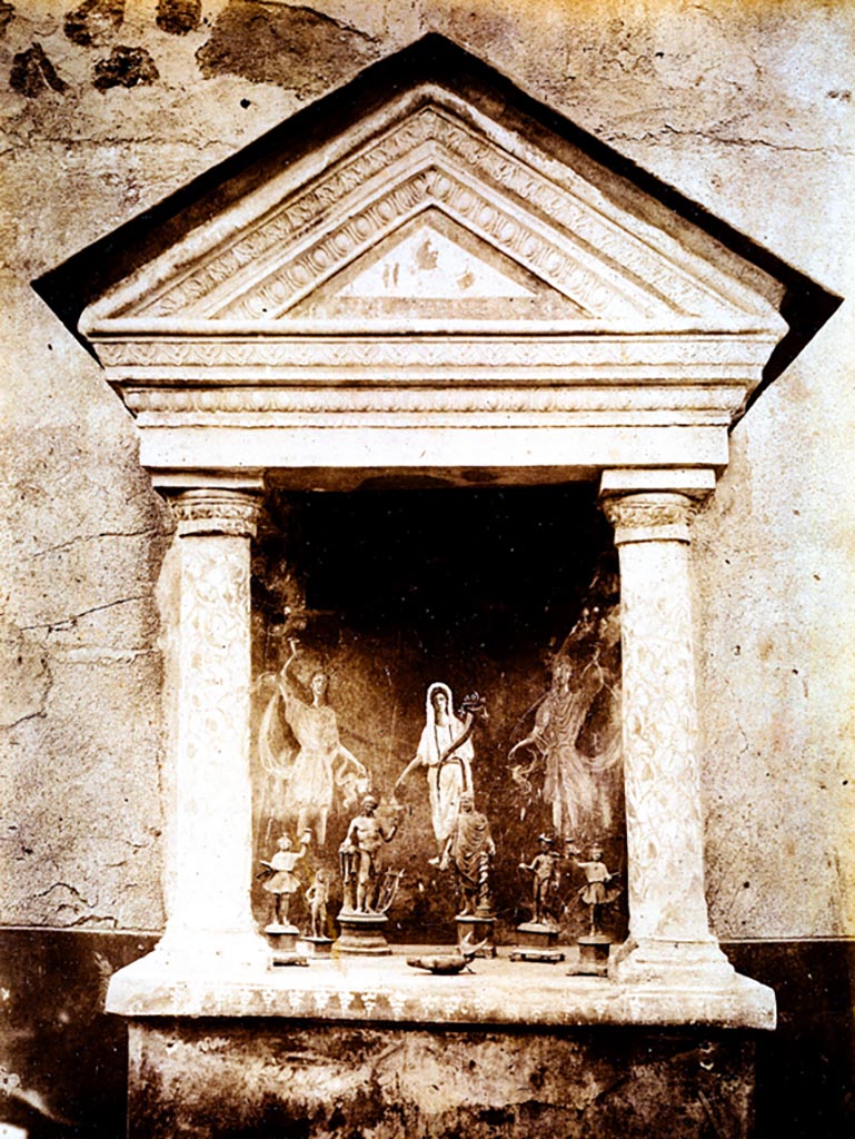 VIII.5.37 Pompeii. 19th century photo numbered 5239. 
Lararium showing Genius, the Lares, statuettes and lamp. Photo courtesy of Espen B. Andersson.

