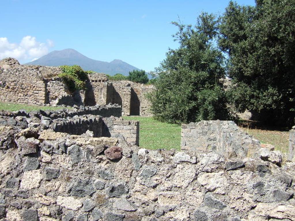 VIII.6.4 Pompeii. September 2005. On the left of the entrance corridor was a triclinium.