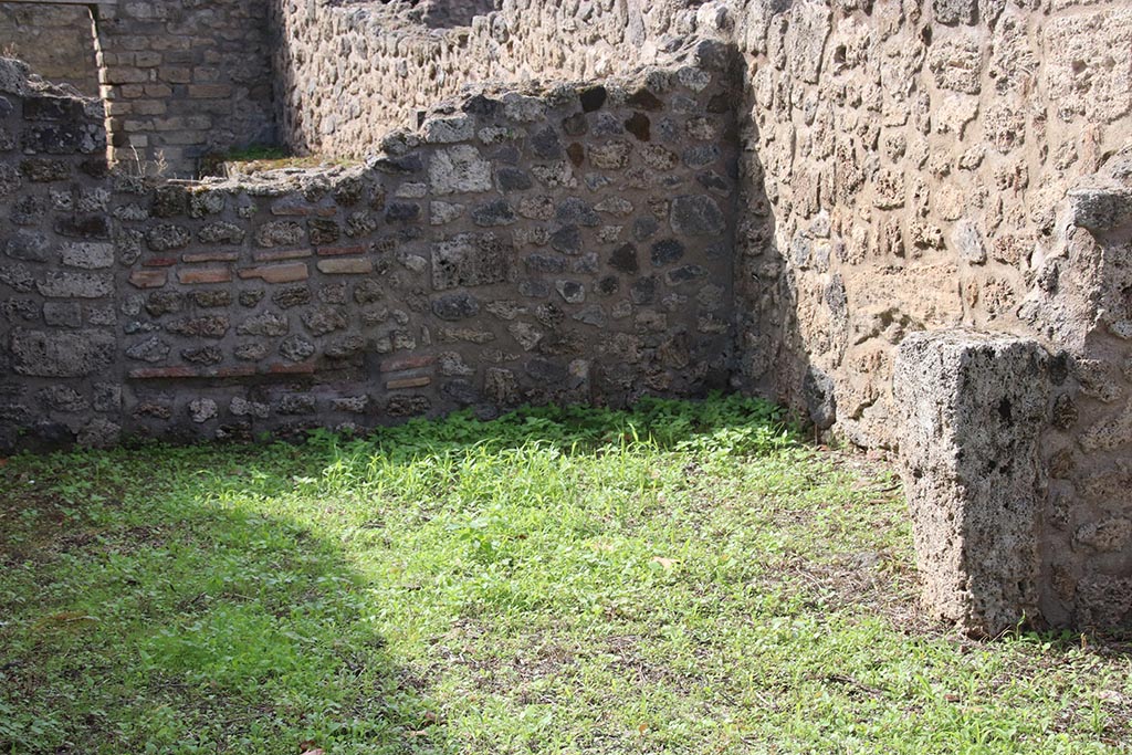 VIII.7.4 Pompeii. October 2024. West wall, north-west corner and north wall of rear room. Photo courtesy of Klaus Heese.