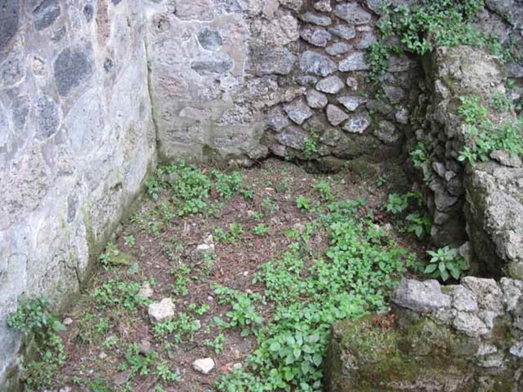 VIII.7.6 Pompeii. September 2010. South-west corner of part of room 3, looking west. In 2008 PARP:PS identified this as a latrine. Photo courtesy of Drew Baker. See http://www.fastionline.org/docs/FOLDER-it-2009-146.pdf. 
